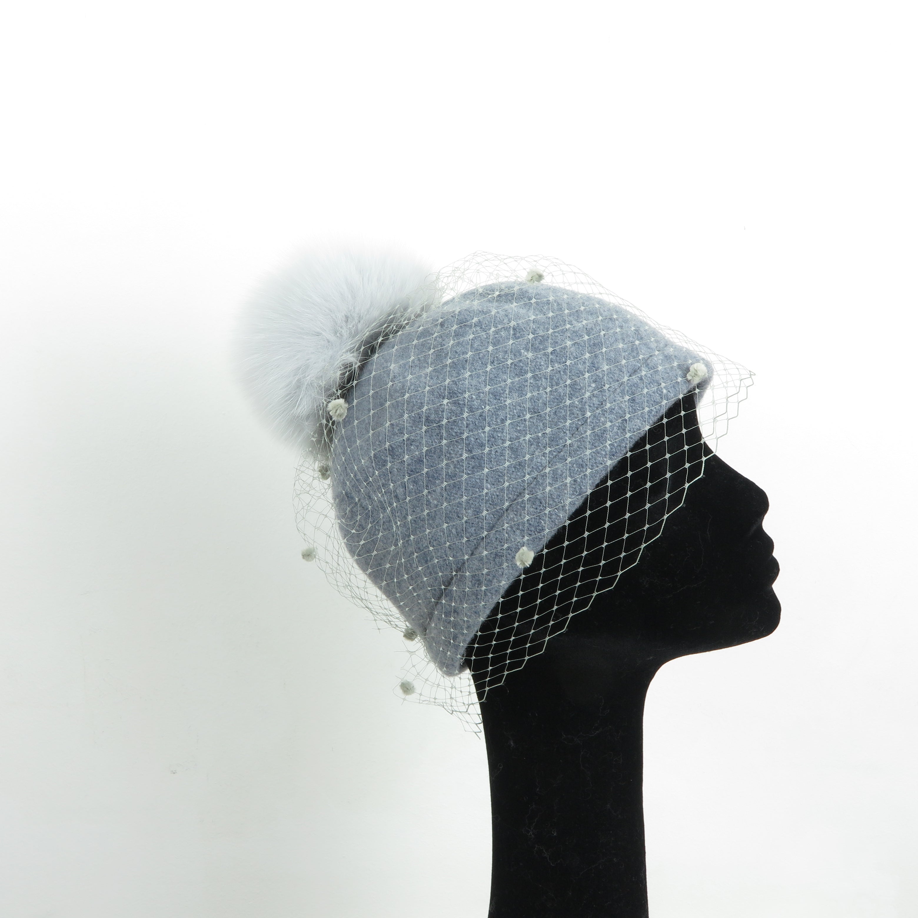 Cuffia grigia con pon pon