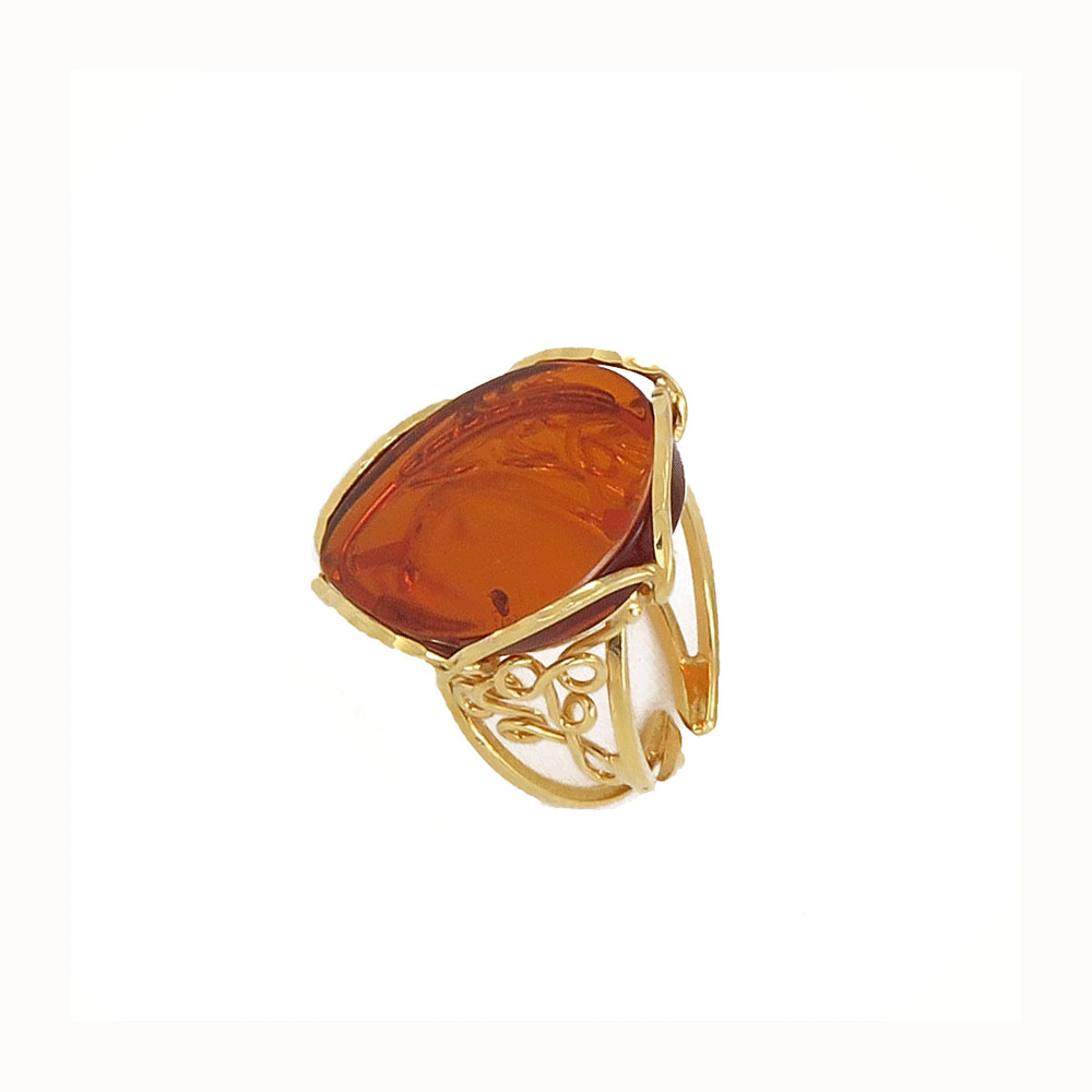 Ring in amber and gilded silver