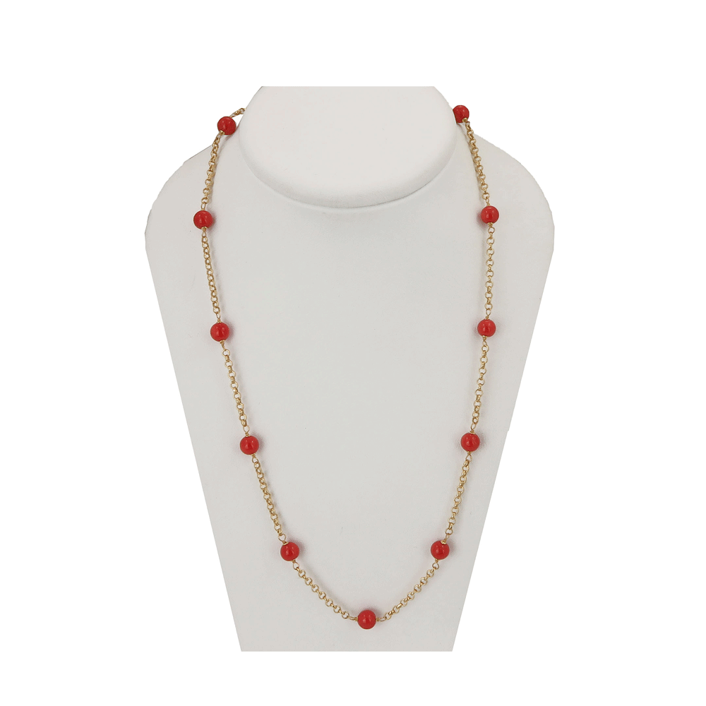 Necklace in 18 kt gold and red coral pearls