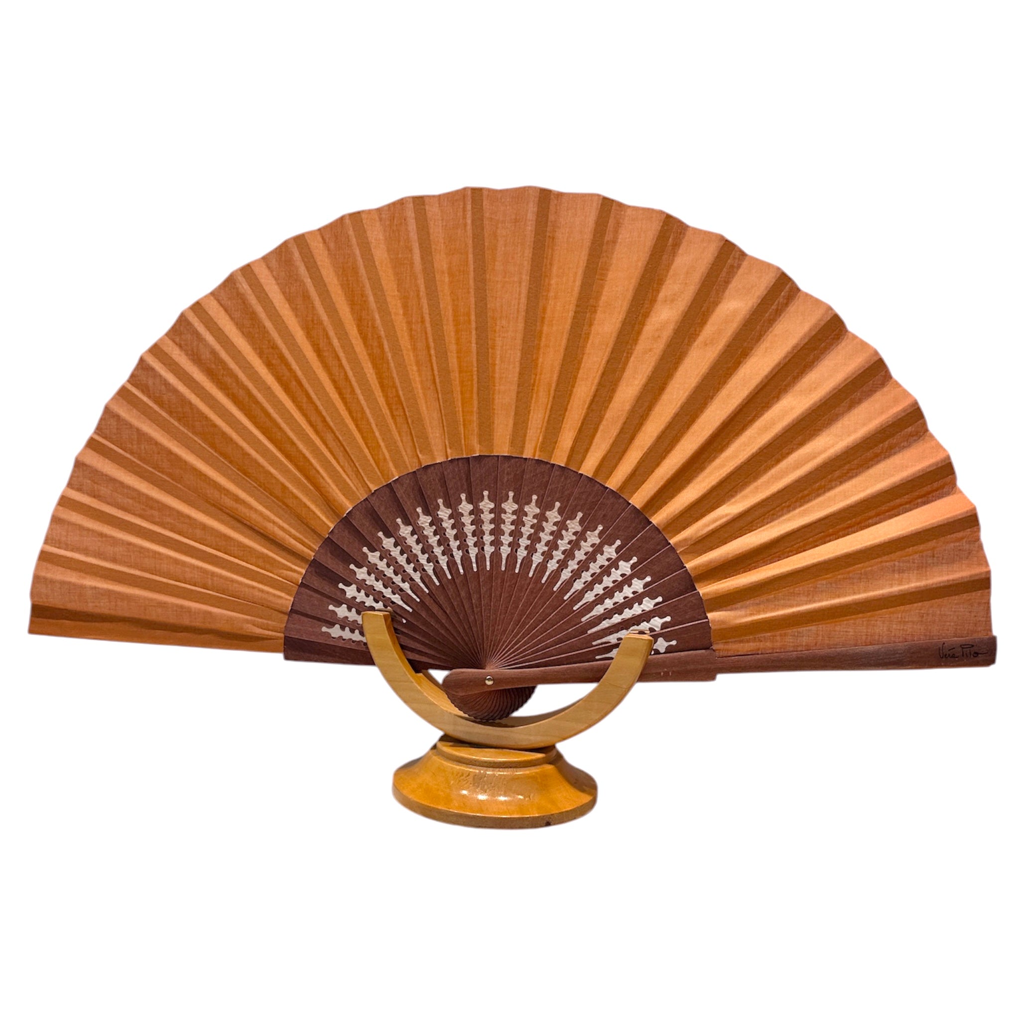 Tobacco-colored fan and wood