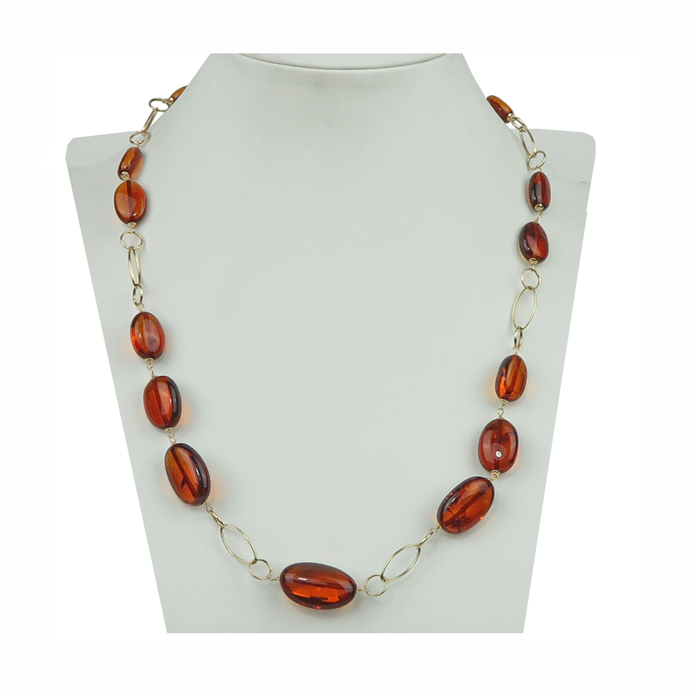 Collana in oro 18 carati con sassi di ambra naturale