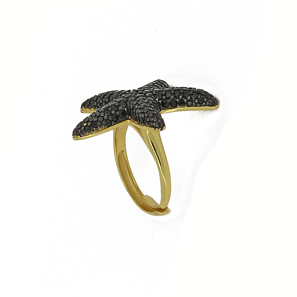 Anello con stella marina e zirconi neri