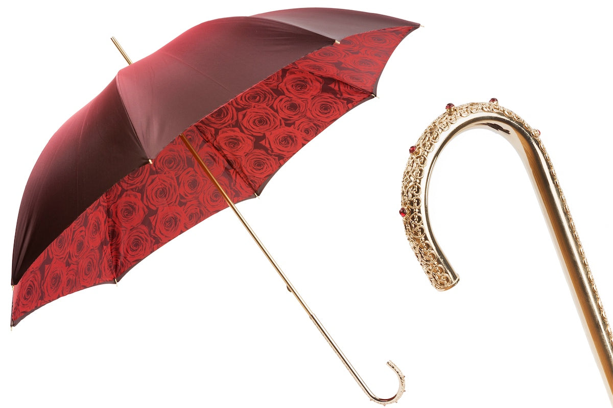 Red women's umbrella with golden handle