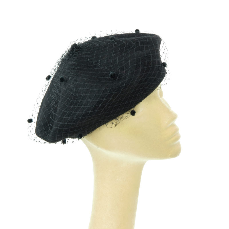 Black beret with veil