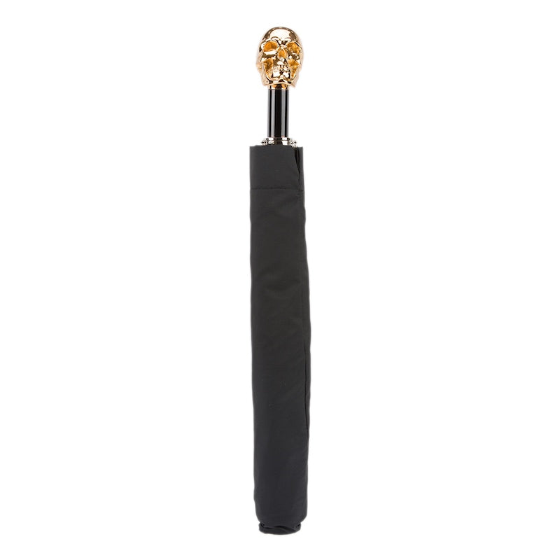 Black folding umbrella with gold skull