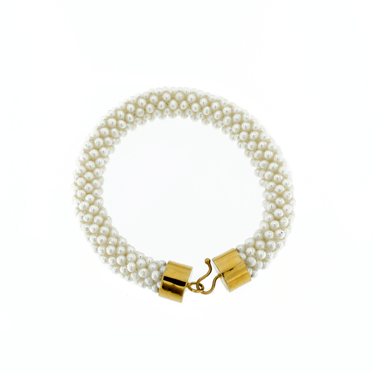 Pearl and gold woven bracelet