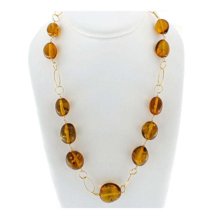 18 kt gold necklace with natural amber stones