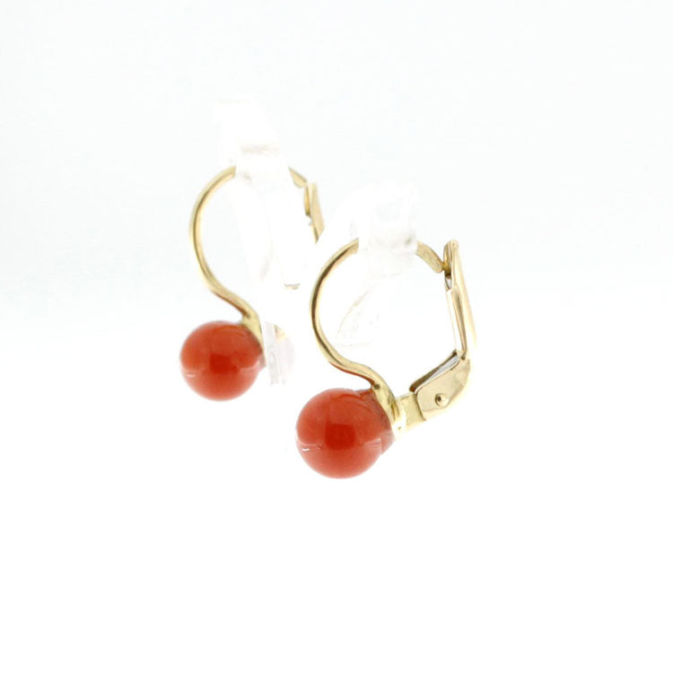 Orecchini in oro 18 kt con pallina di corallo rosso