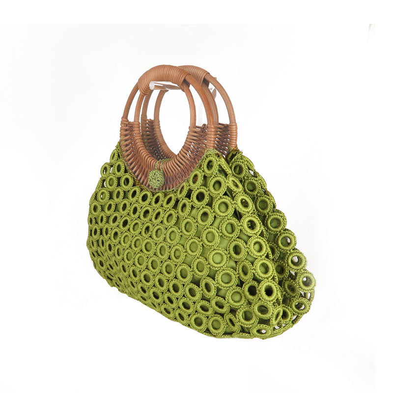 Green crochet bag with bamboo handles