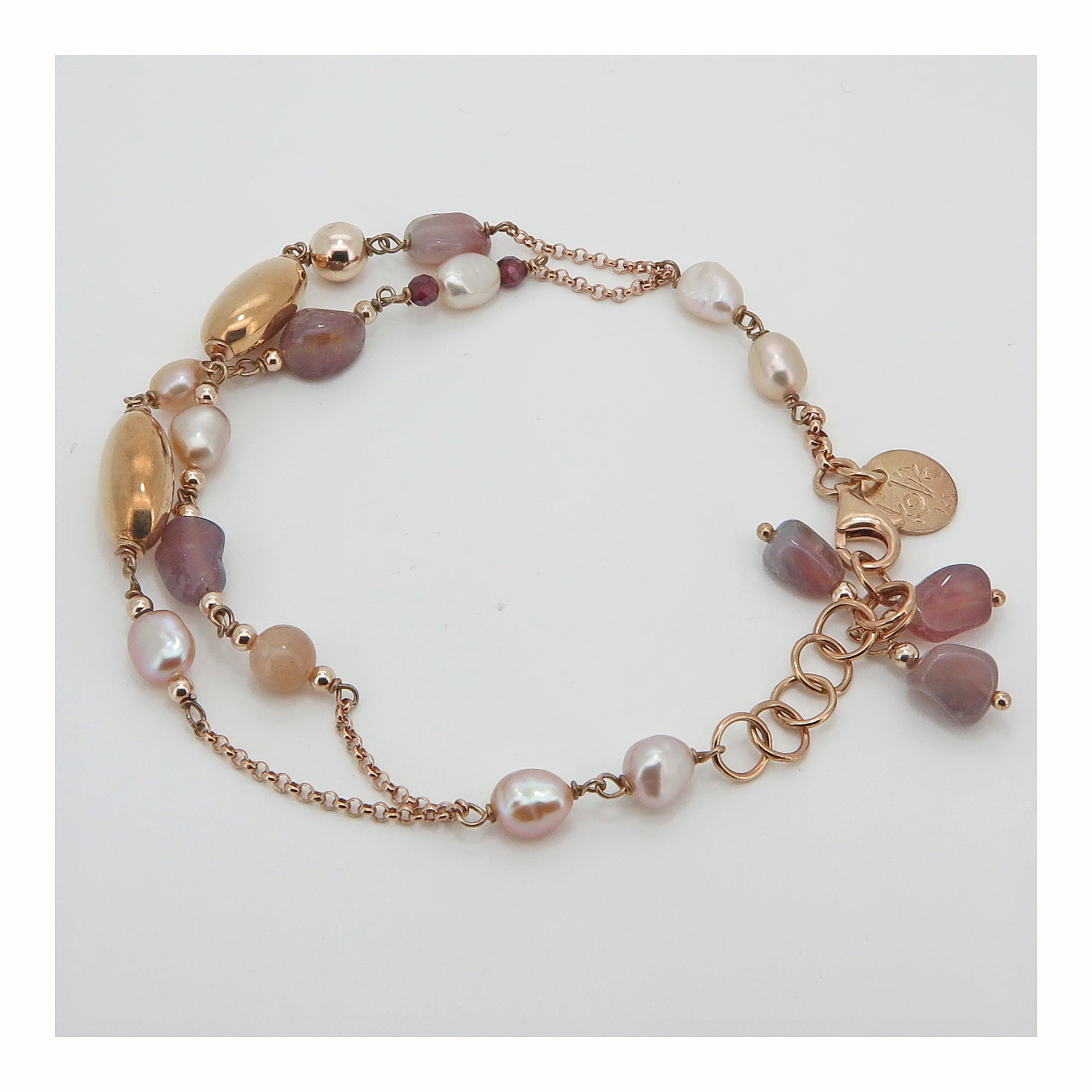 Bracciale con pietre dure rosa in argento rosé a due fili