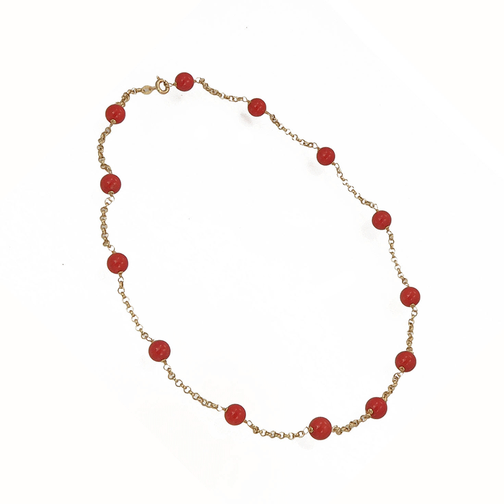 Necklace in 18 kt gold and red coral pearls