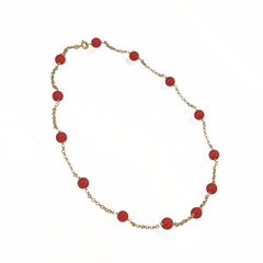 Necklace in 18 kt gold and red coral pearls