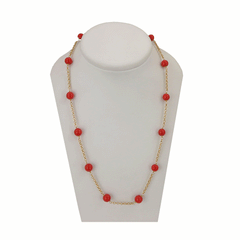 Necklace in 18 kt gold and red coral pearls