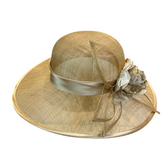Gold coloured ceremonial hat with flower