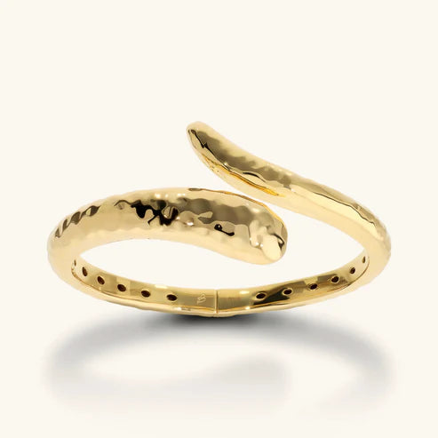 Bracciale rigido contrarier dorato martellato