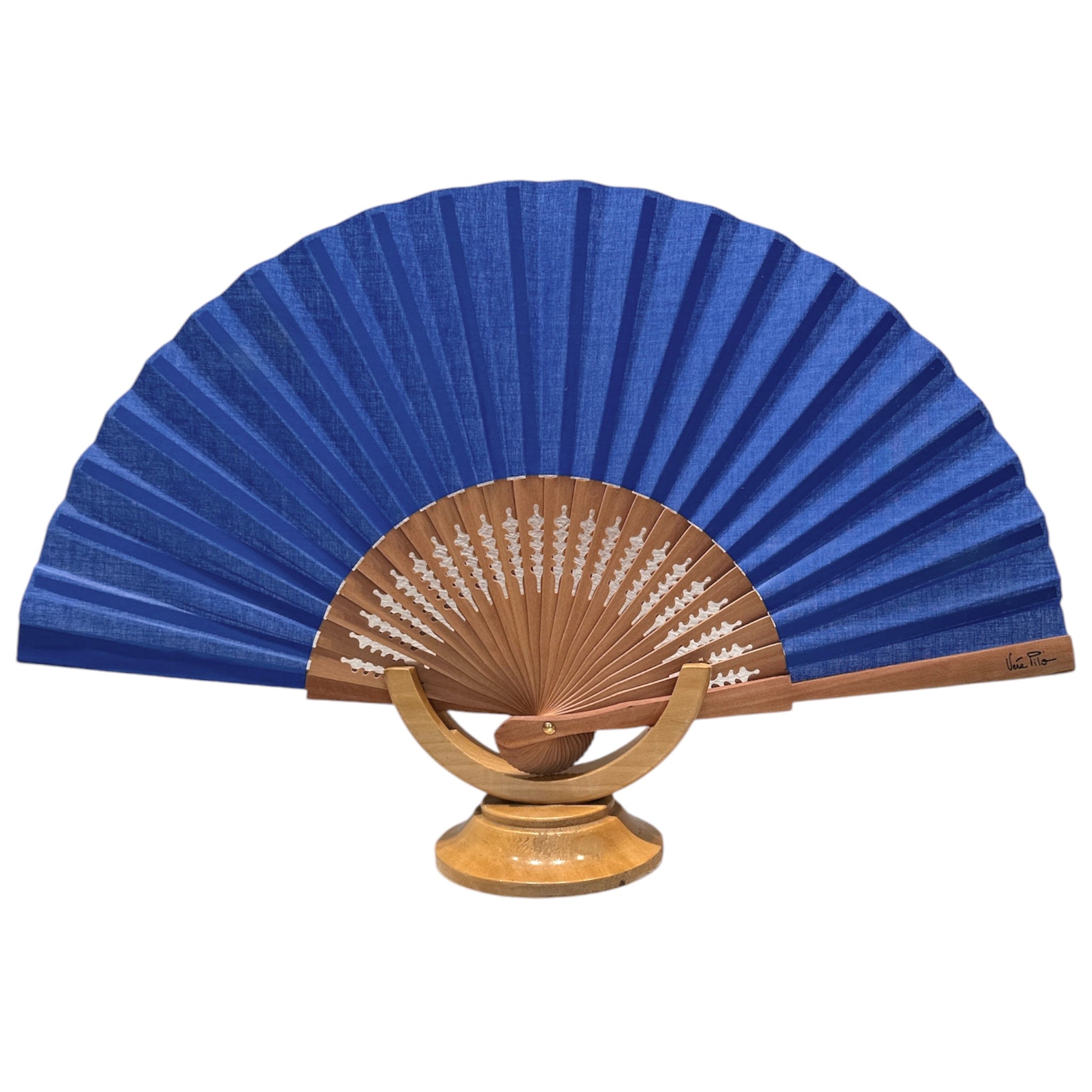 Blue and wood fan