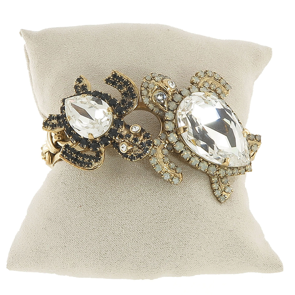 Bracciale rigido in ottone con tartarughe