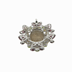 Spilla gioiello in argento con granato e topazi