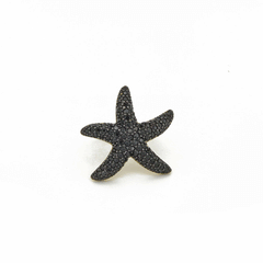 Anello con stella marina e zirconi neri