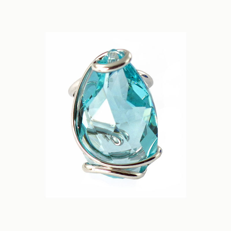 Ring with rhodium-plated teardrop crystal