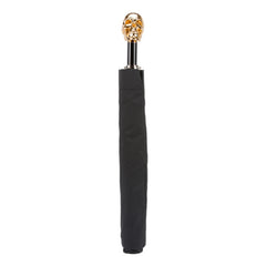 Black folding umbrella with gold skull