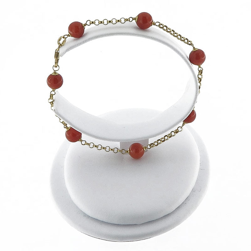 18 kt gold bracelet with red coral pearls