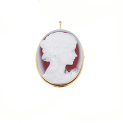 Spilla e ciondolo cammeo in oro e corniola