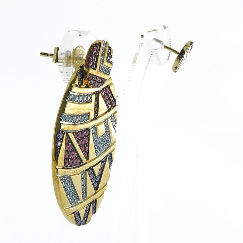 Orecchini in argento dorato asimmetrici