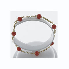 Bracciale in oro 18 kt con perle di corallo rosso
