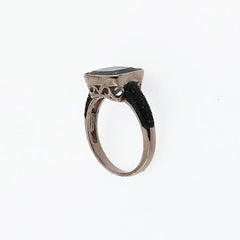 Ring in rosé silver and black zircons