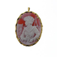 Gold cameo brooch and pendant with woman at the window