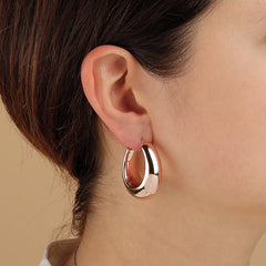 Pink rounded hoop earrings